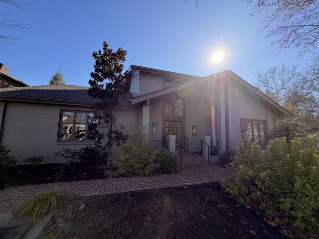 a view of entryway and hall with a rug