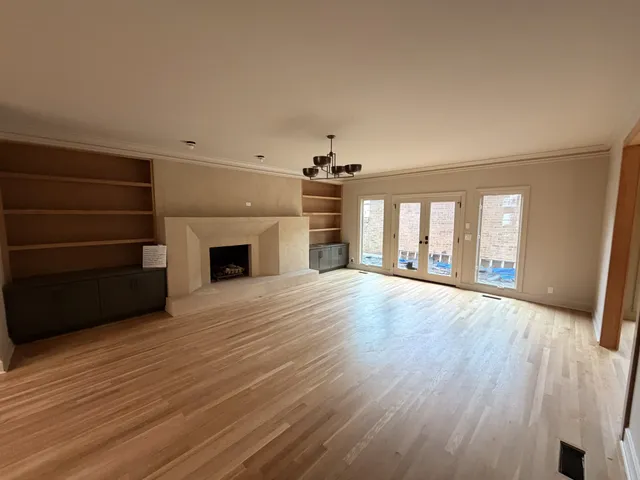 a bathroom with a granite countertop sink window and a mirror