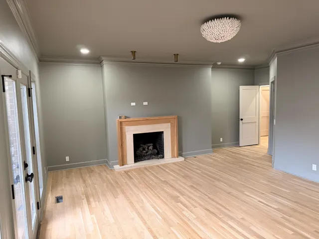 a bathroom with a double vanity sink and mirror