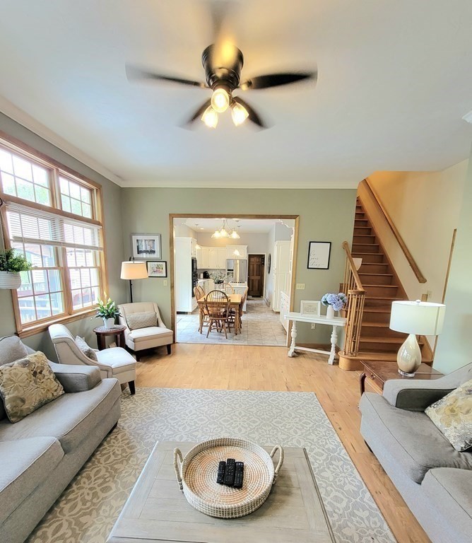 43 Mendon Road Sutton, MA 01590 - Photo 15 of 37 a living room with furniture and a large window