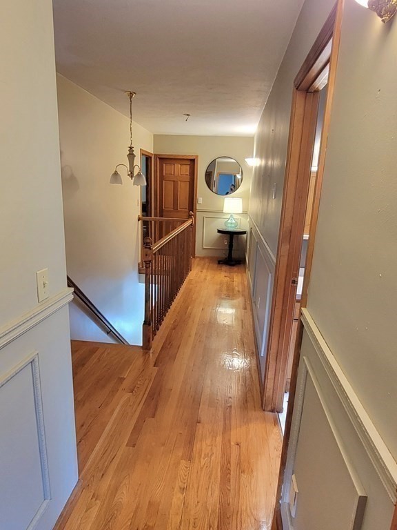 43 Mendon Road Sutton, MA 01590 - Photo 20 of 37 a view of living room filled with furniture and wooden floor