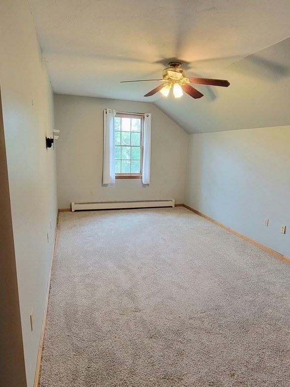 43 Mendon Road Sutton, MA 01590 - Photo 21 of 37 an empty room with windows and fan
