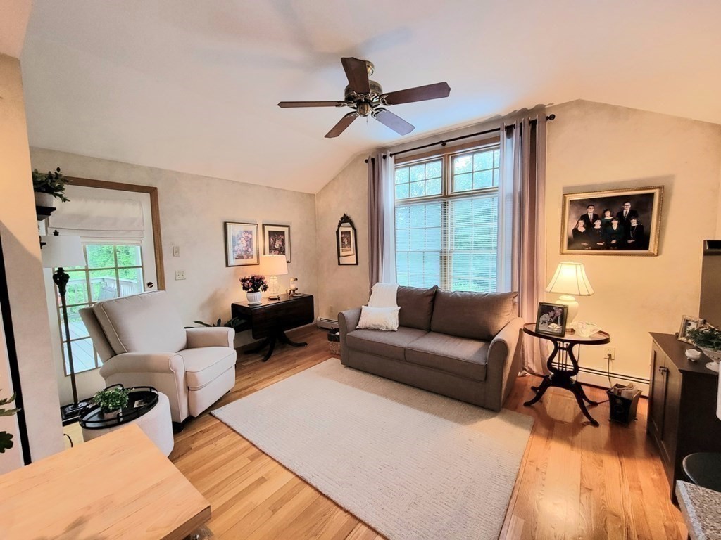 43 Mendon Road Sutton, MA 01590 - Photo 31 of 37 a living room with furniture and a large window