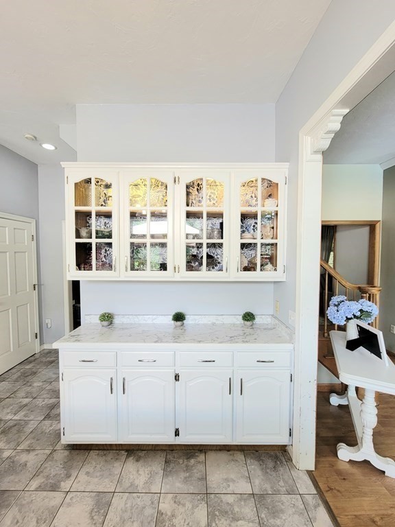43 Mendon Road Sutton, MA 01590 - Photo 10 of 37 a kitchen with a sink and cabinets