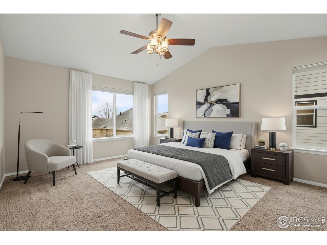 5894 Graphite Street Timnath, CO 80547 - Photo 26 of 50 a bed room with a bed and a chair