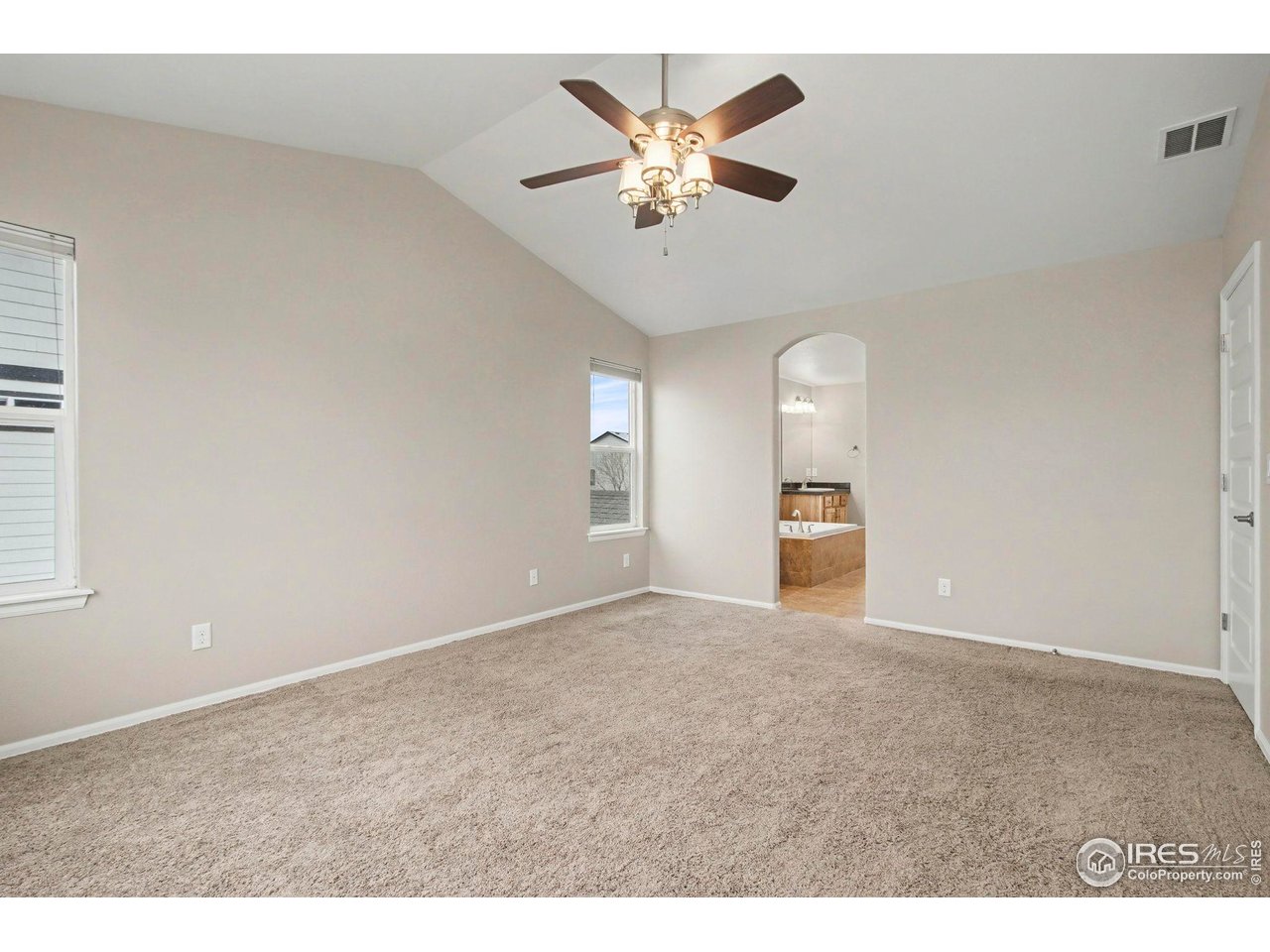 5894 Graphite Street Timnath, CO 80547 - Photo 27 of 50 a view of an empty room with a ceiling fan
