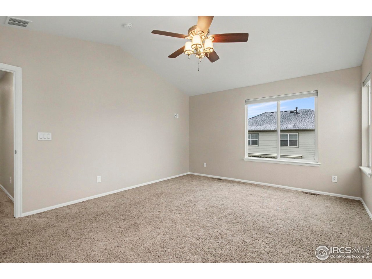 5894 Graphite Street Timnath, CO 80547 - Photo 28 of 50 a view of an empty room with a window