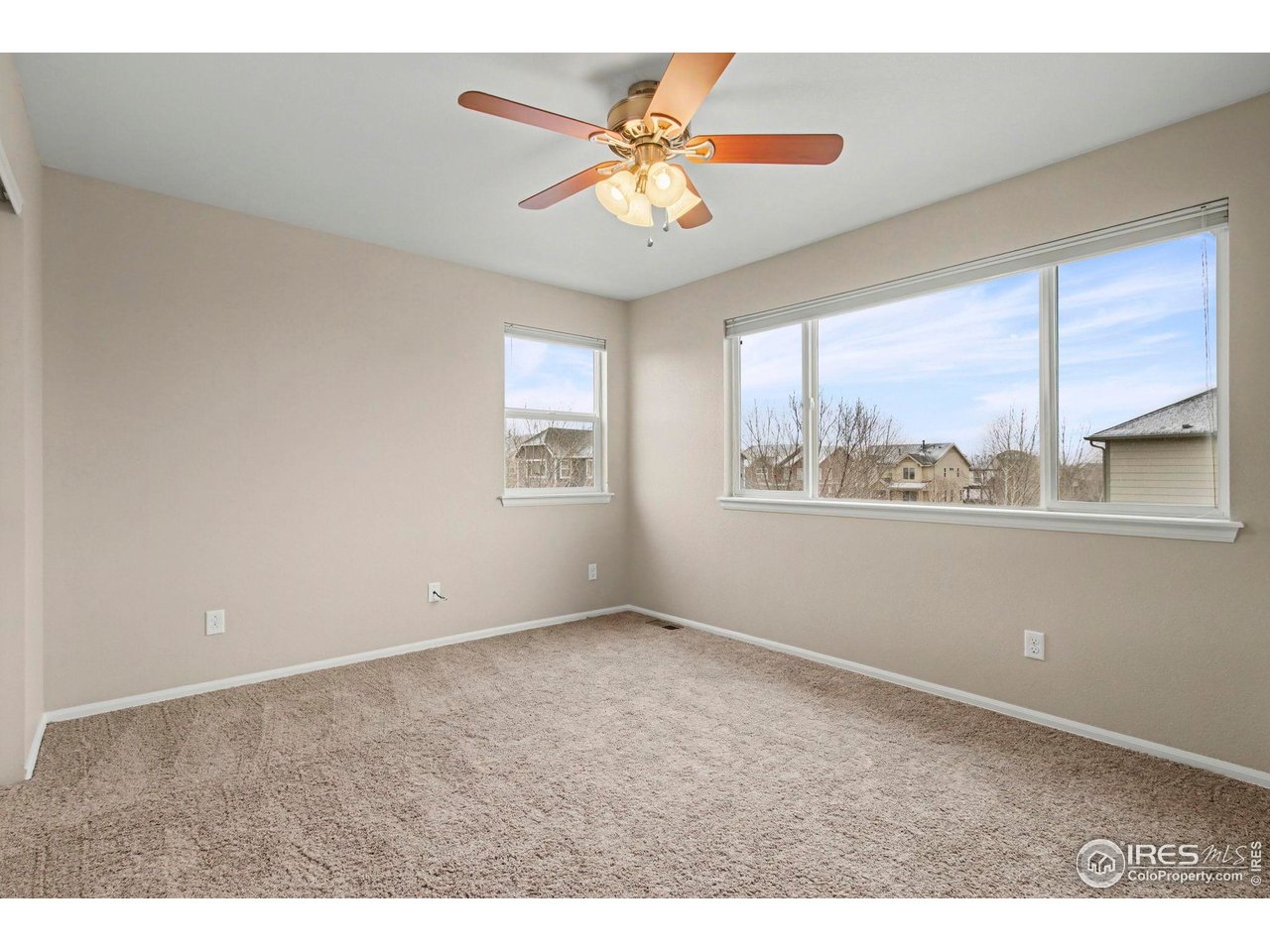 5894 Graphite Street Timnath, CO 80547 - Photo 31 of 50 a view of an empty room with a window
