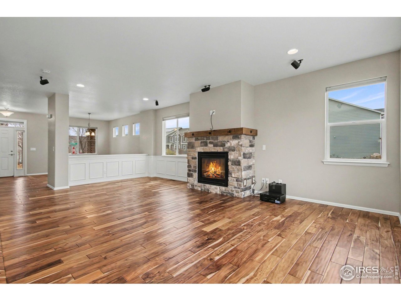 5894 Graphite Street Timnath, CO 80547 - Photo 9 of 50 a view of a livingroom with a fireplace