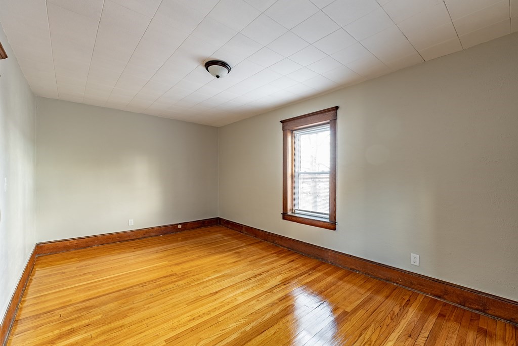 41-49 Belmont Avenue Springfield, MA 01108 - Photo 11 of 18 a view of empty room with window