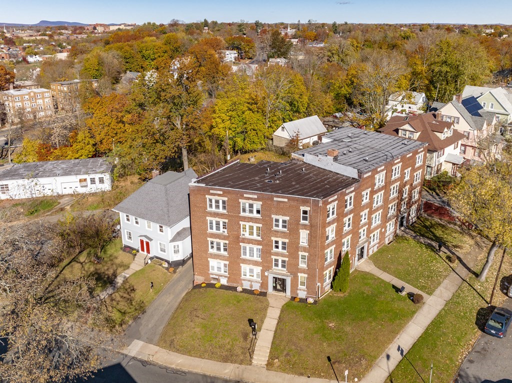41-49 Belmont Avenue Springfield, MA 01108 - Photo 3 of 18 an aerial view of residential houses with outdoor space