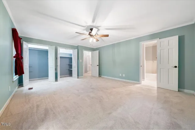 a bathroom with a double vanity sink and mirror