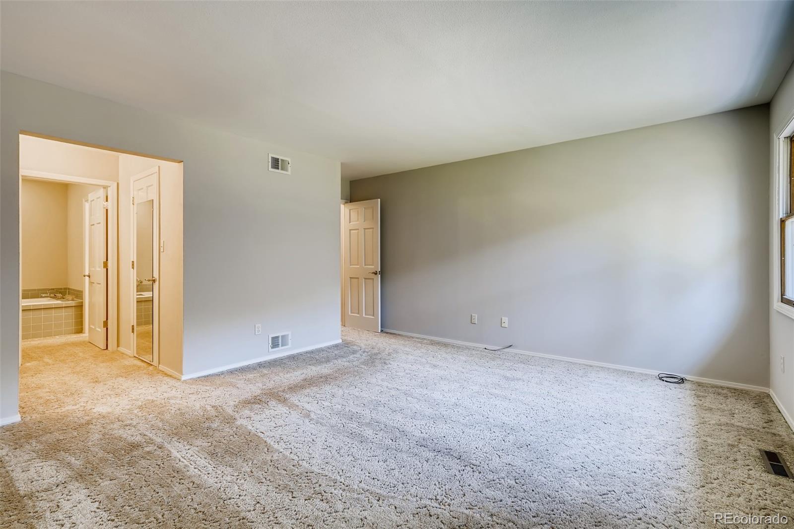 8022 West 78th Way Arvada, CO 80005 - Photo 17 of 30 an empty room with closet area