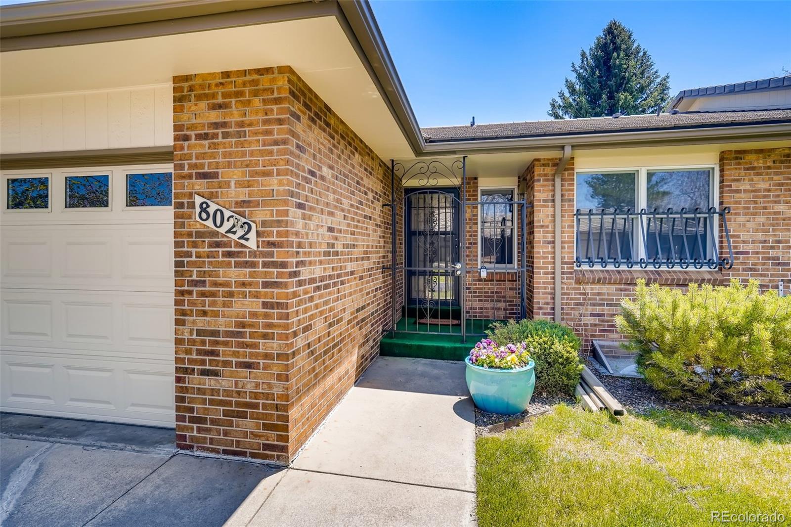 8022 West 78th Way Arvada, CO 80005 - Photo 3 of 30 a view of a front door of the house