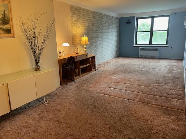 87-10 204th Street, Unit A62 Queens, NY 11423 - Photo 4 of 16 a view of livingroom with furniture