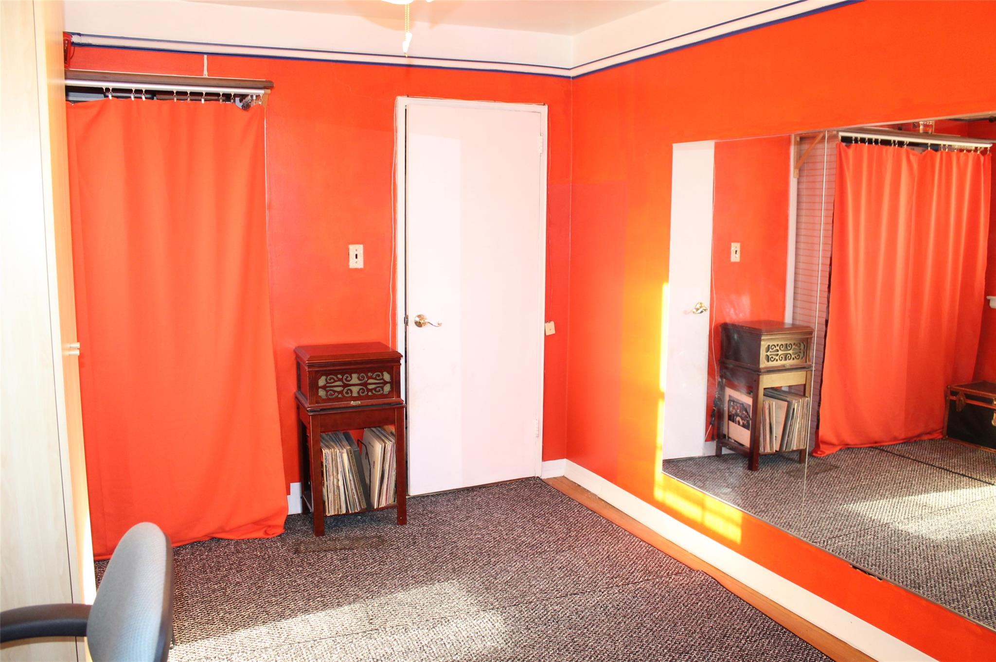 87-10 204th Street, Unit A62 Queens, NY 11423 - Photo 8 of 16 a bedroom with a bed and a window