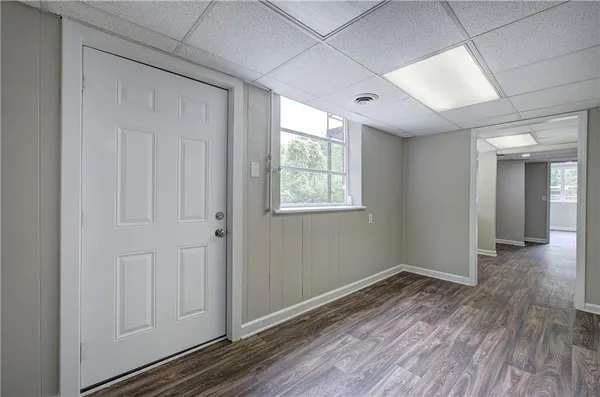 a view of a livingroom with wooden floor