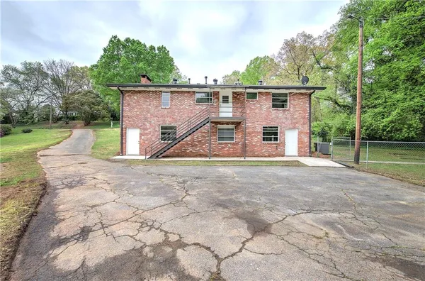 front view of a house with yard