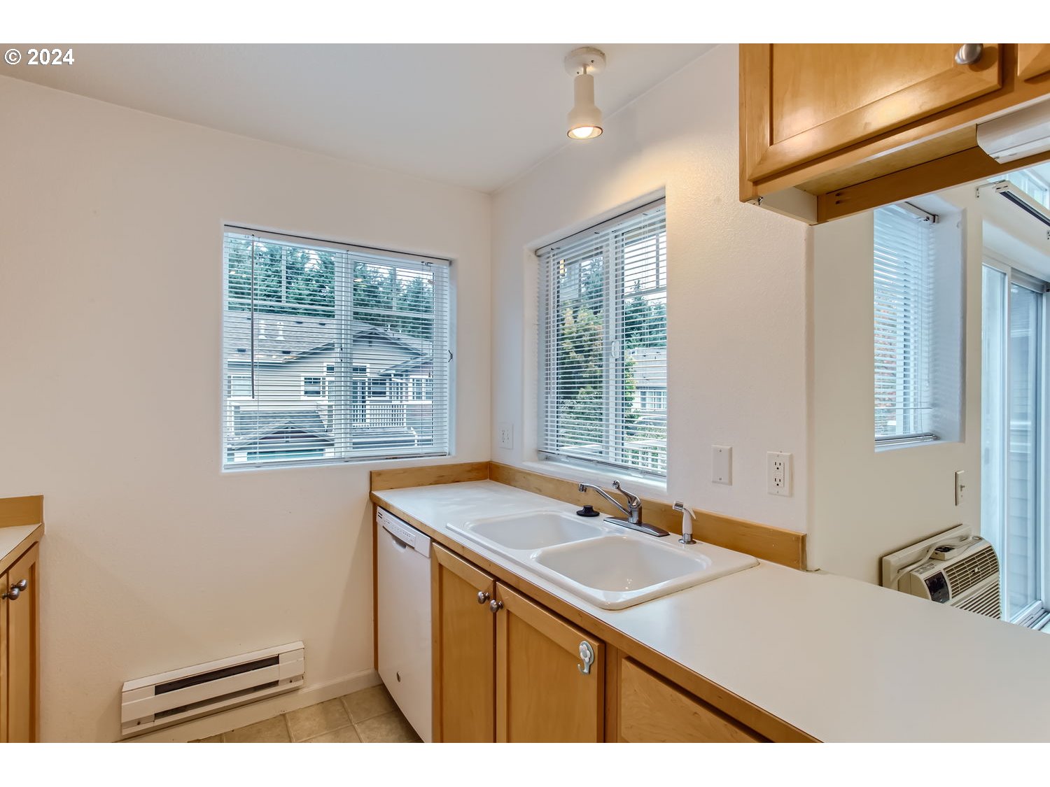 14740 Southwest Sandhill Loop, Unit 203 Beaverton, OR 97007 - Photo 20 of 35 a bathroom with a sink and a bathtub