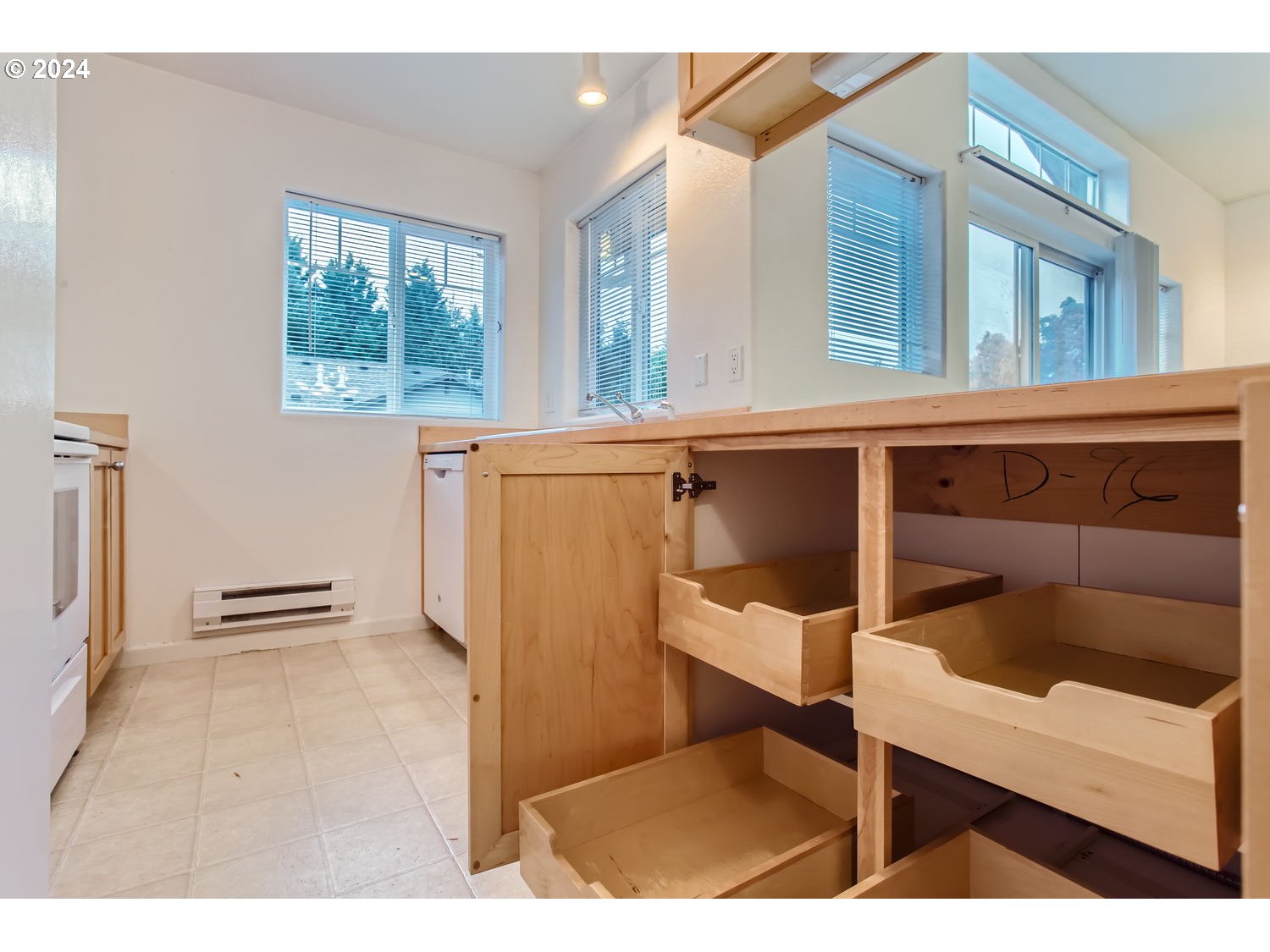 14740 Southwest Sandhill Loop, Unit 203 Beaverton, OR 97007 - Photo 21 of 35 a view of walk in closet with window