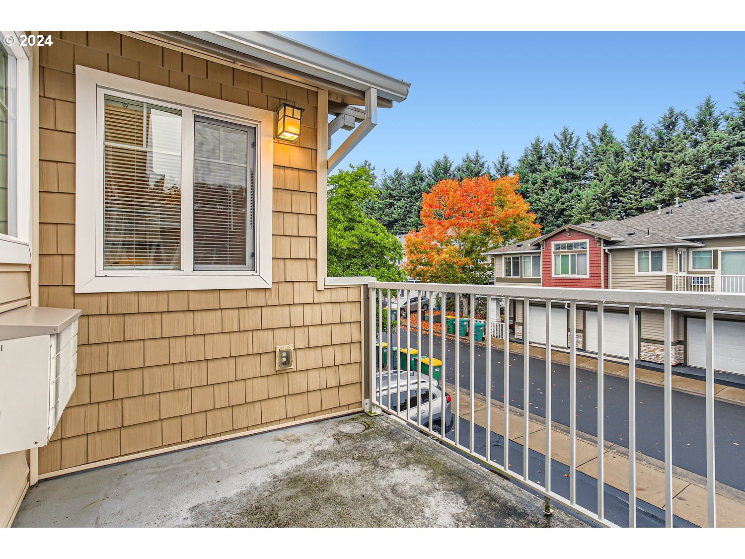 14740 Southwest Sandhill Loop, Unit 203 Beaverton, OR 97007 - Photo 34 of 35 a backyard of a house with lots of green space
