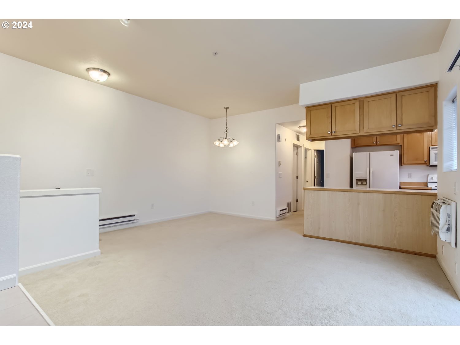 14740 Southwest Sandhill Loop, Unit 203 Beaverton, OR 97007 - Photo 7 of 35 a view of a kitchen with a sink