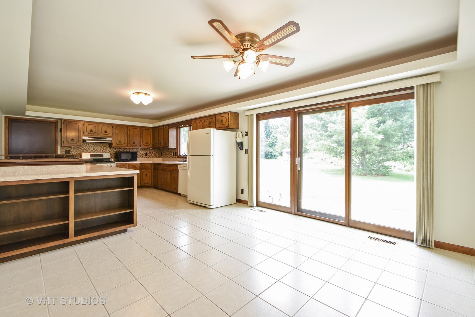 25140 South Rondorey Road Elwood, IL 60421 - Photo 6 of 20 a kitchen with a refrigerator a stove top oven a sink and cabinets