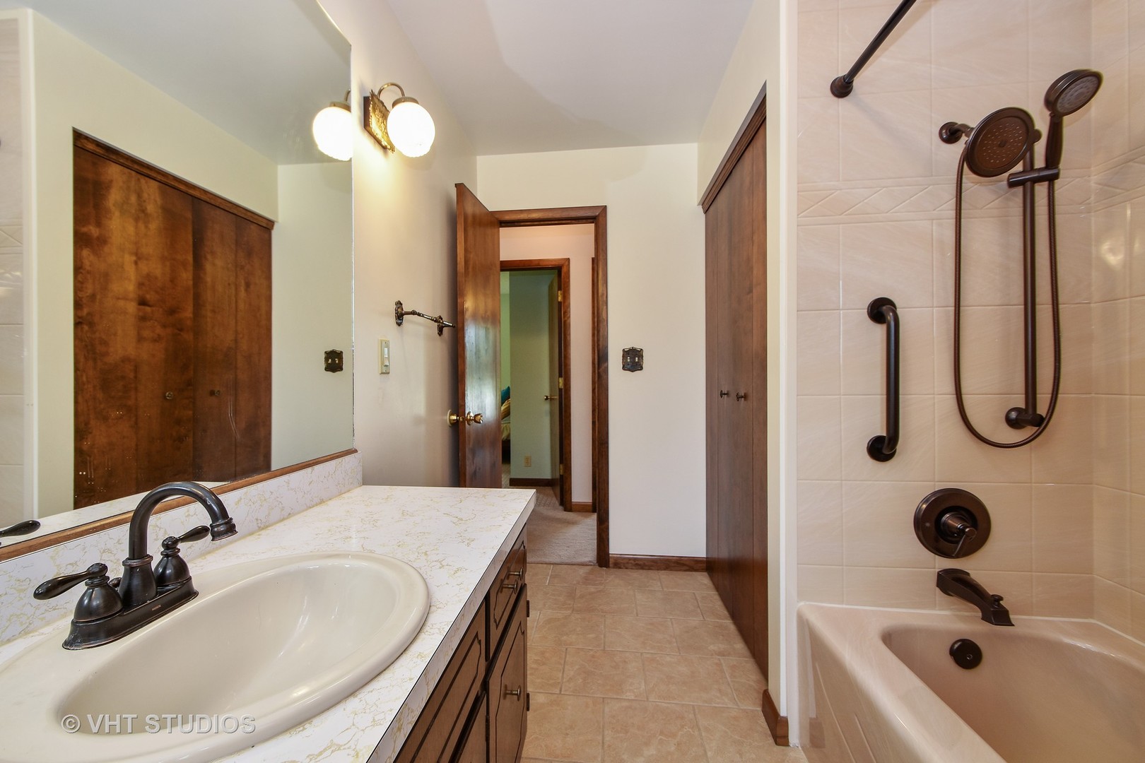 25140 South Rondorey Road Elwood, IL 60421 - Photo 10 of 20 a bathroom with a tub sink and mirror