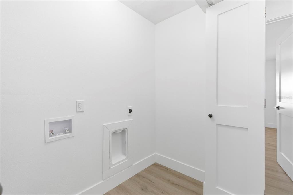 1448 South Belcher Road Largo, FL 33771 - Photo 18 of 47 a view of a room with wooden floor