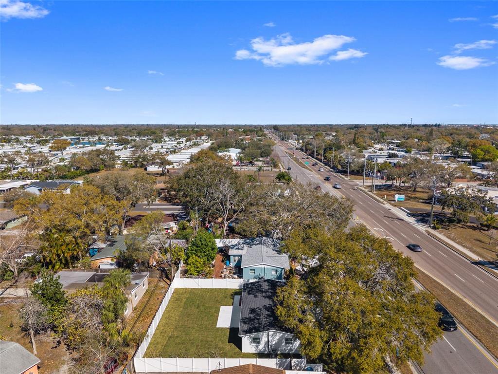 1448 South Belcher Road Largo, FL 33771 - Photo 41 of 47 an aerial view of residential building with yard