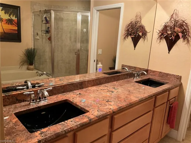 a kitchen with a sink and a stove