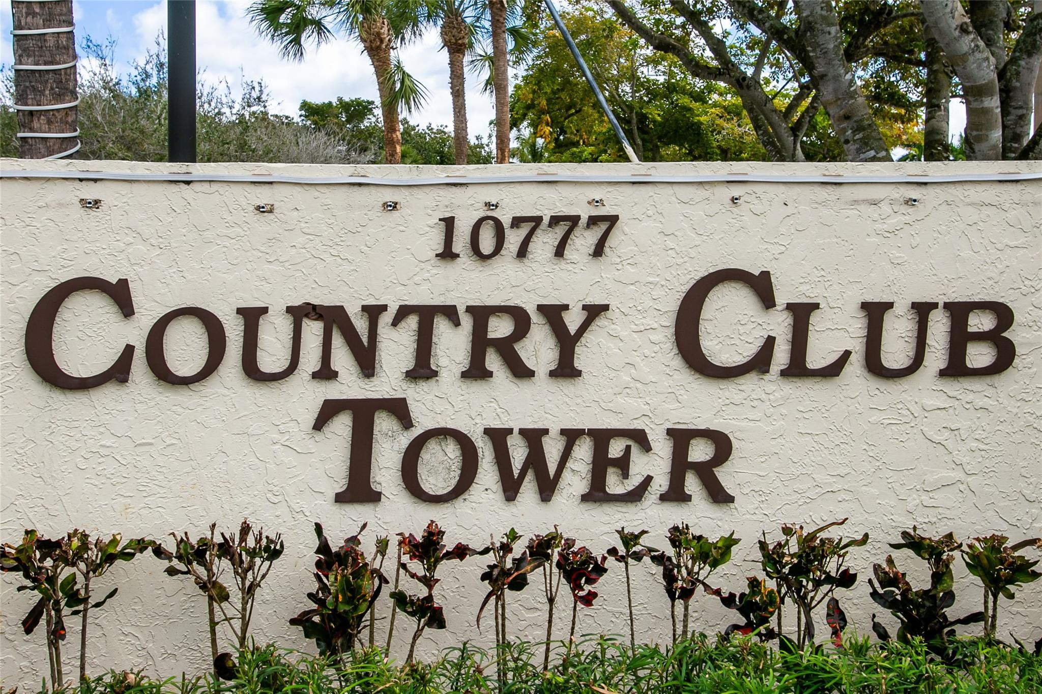 10777 West Sample Road, Unit 718 Coral Springs, FL 33065 - Photo 2 of 16 a view of a sign board