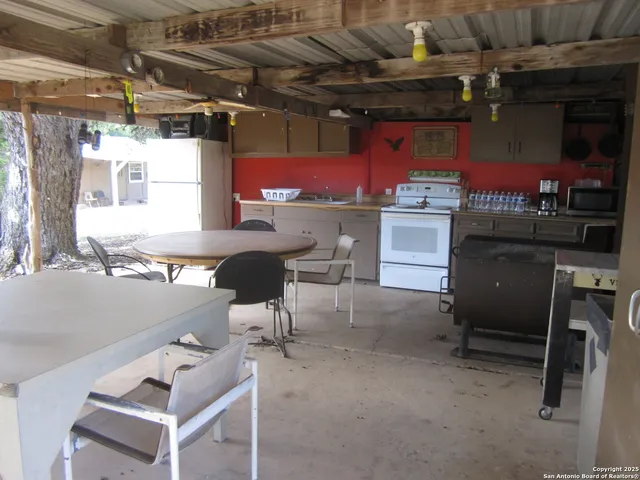 a view of a lake with top of house