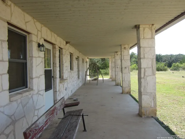 a bedroom with a bed and cabinets