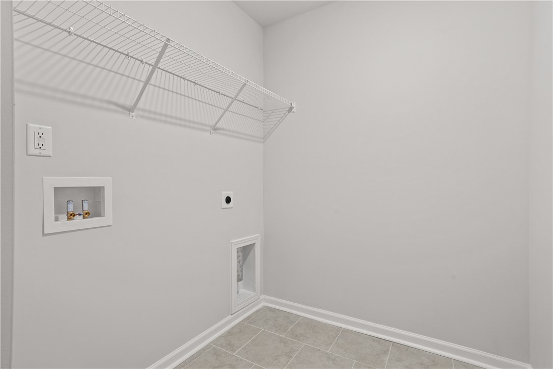 631 Sweetspire Trail, Unit 148 Seneca, SC 29678 - Photo 14 of 36 Ready for appliances, a dedicated utility room ensures household efficiency.