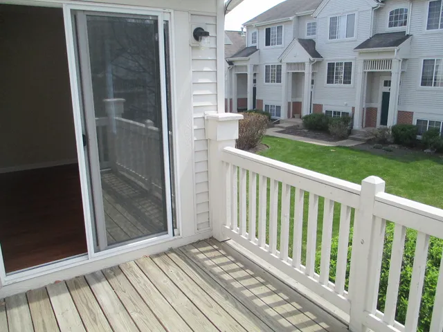 a view of a brick building from a balcony