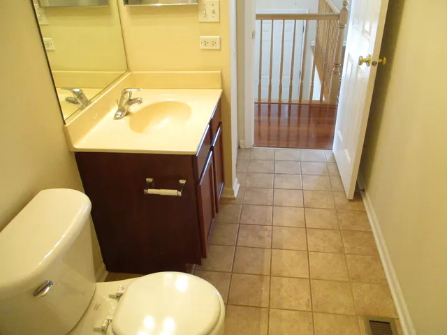 a bathroom with a sink and toilet