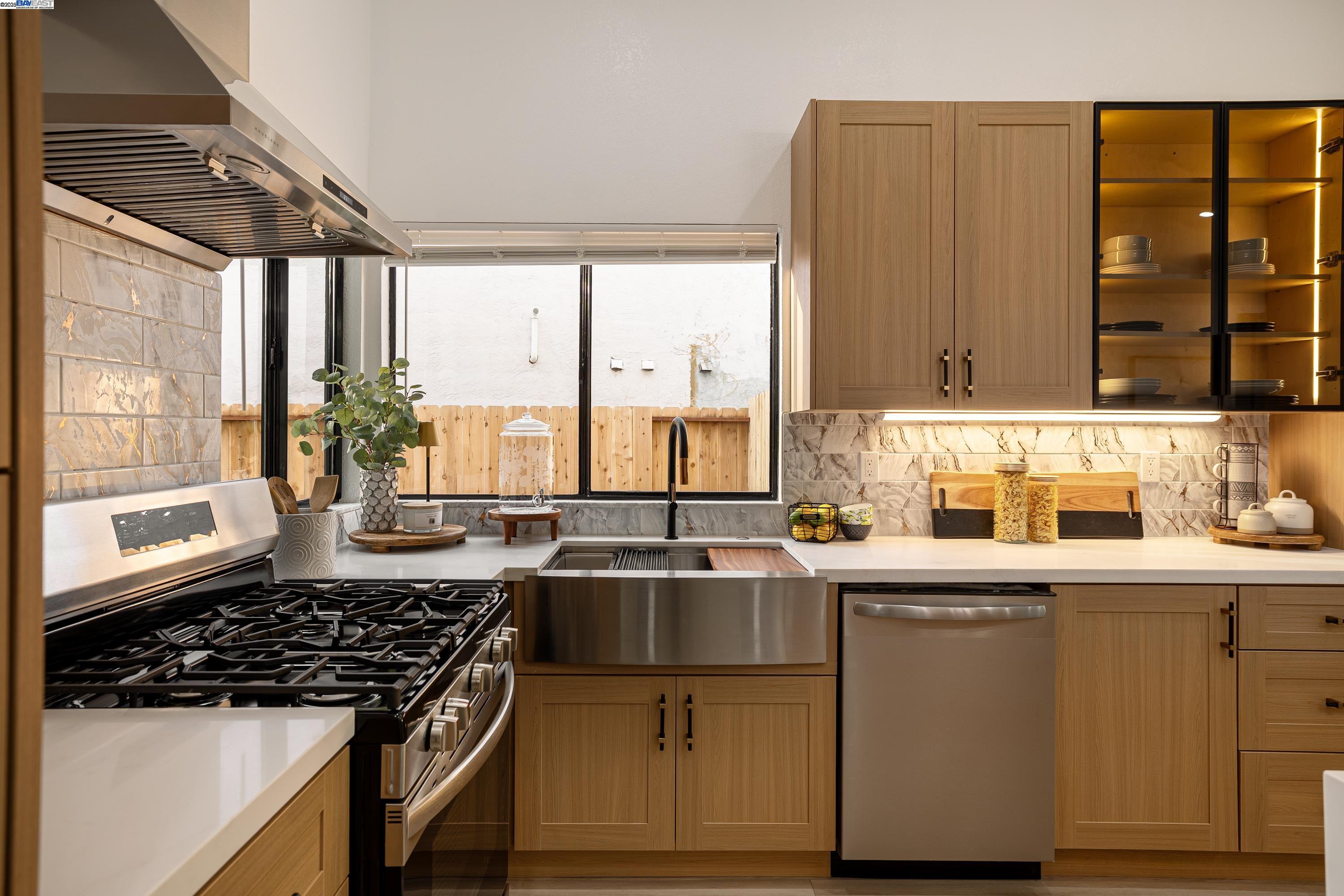 713 Sandy Brook Court Rodeo, CA 94572 - Photo 13 of 36 a kitchen with a sink and large window