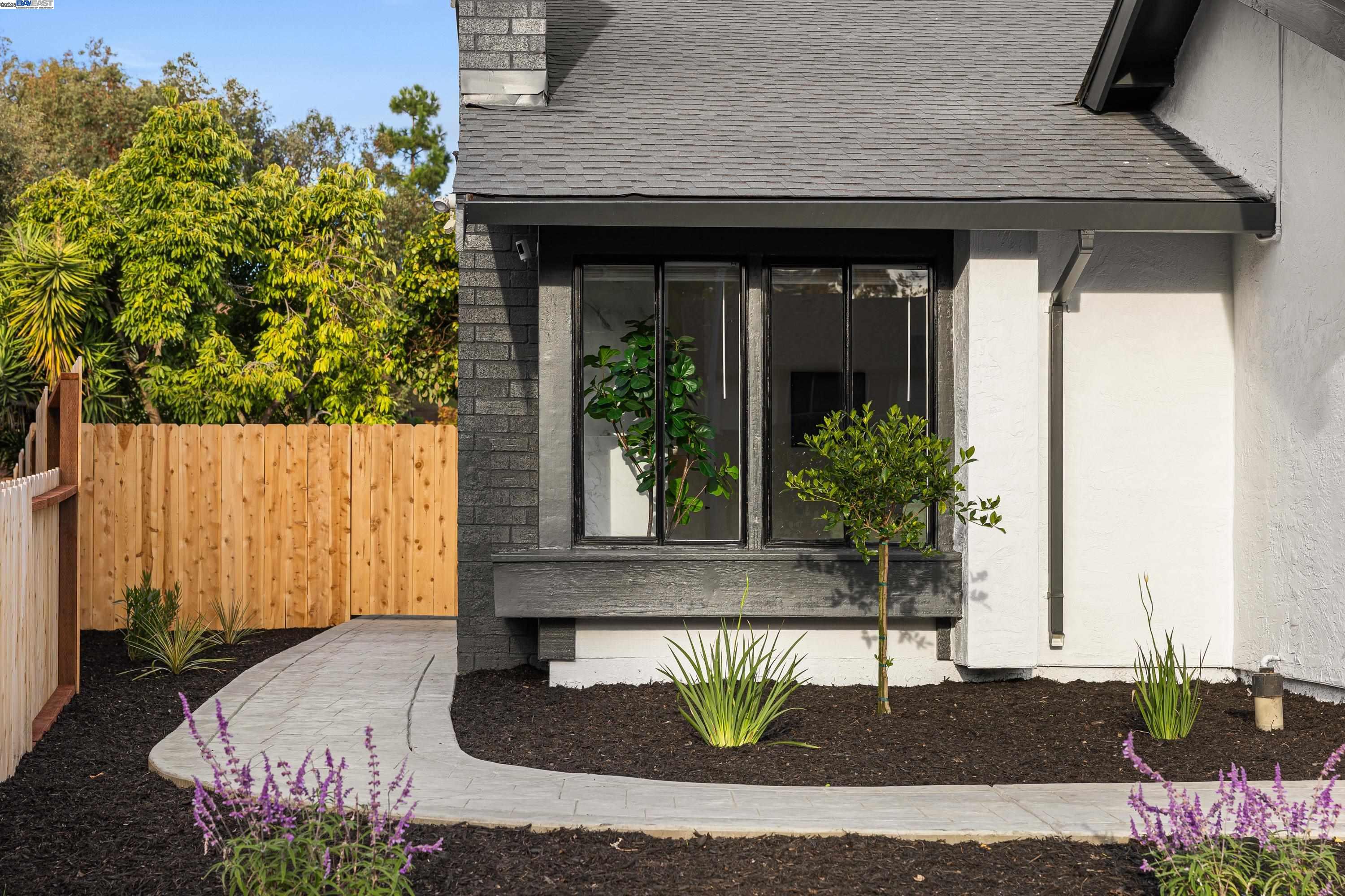 713 Sandy Brook Court Rodeo, CA 94572 - Photo 2 of 36 a front view of a house with garden