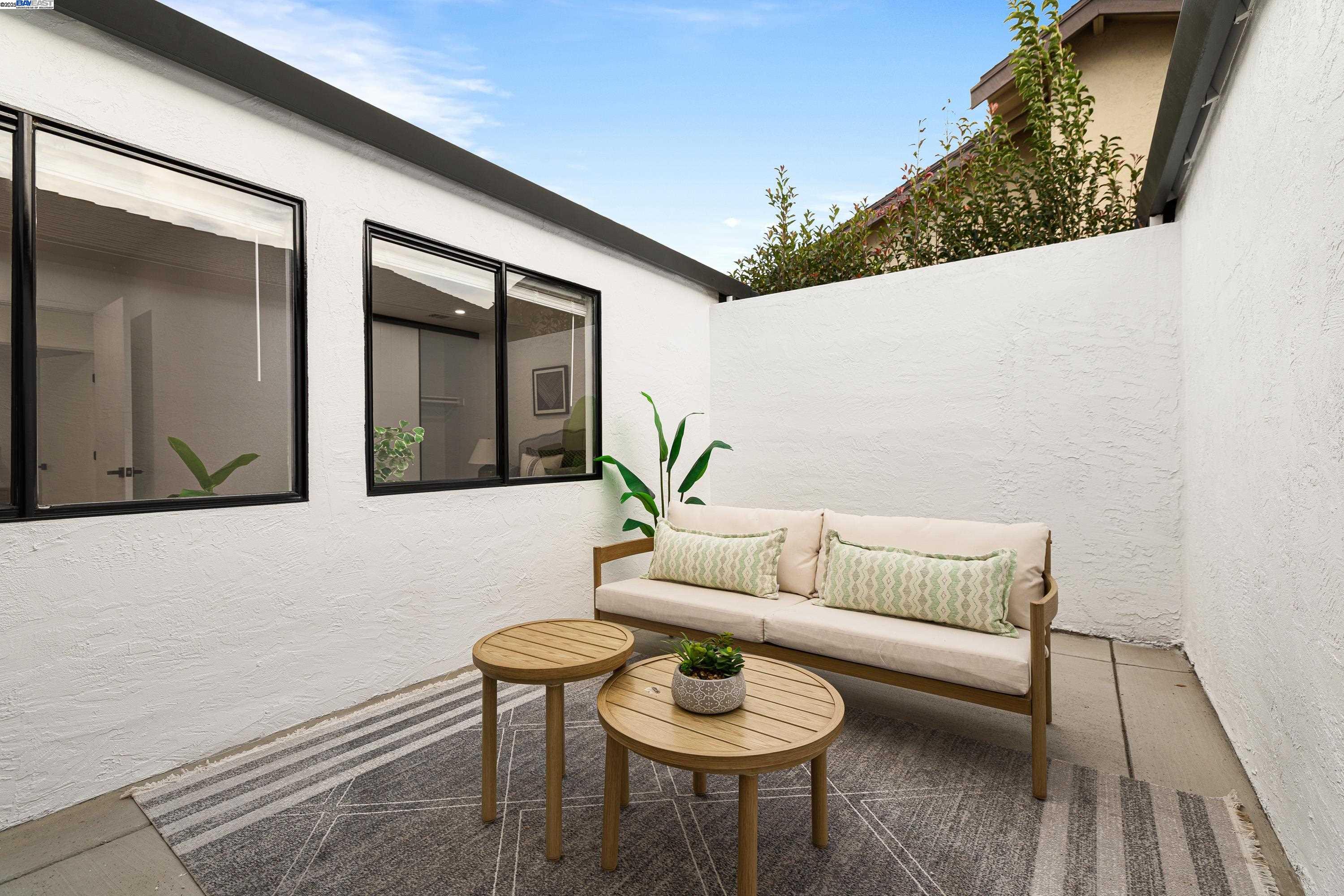 713 Sandy Brook Court Rodeo, CA 94572 - Photo 29 of 36 a view of patio with couches and a potted plant
