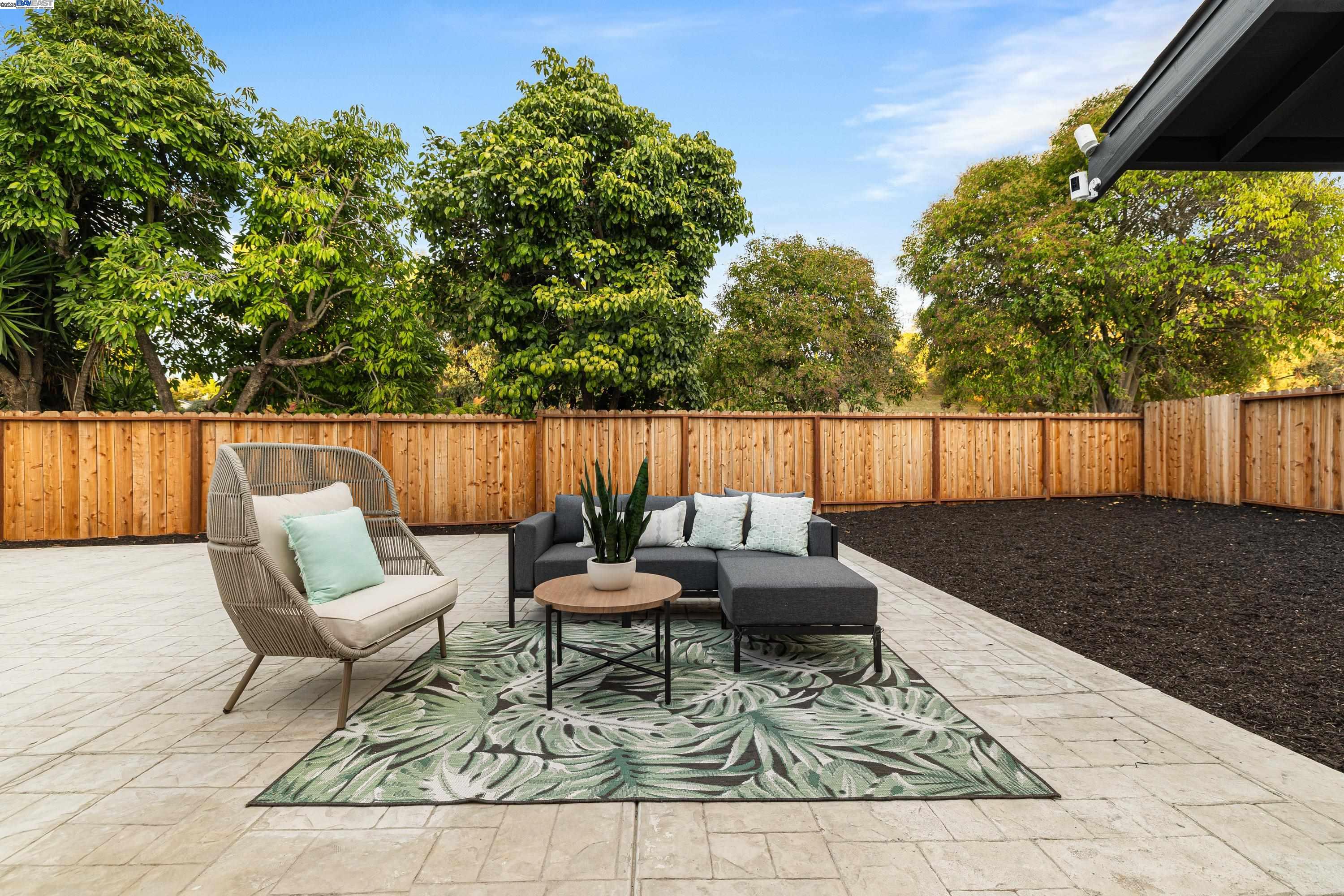 713 Sandy Brook Court Rodeo, CA 94572 - Photo 31 of 36 a outdoor living space with furniture and a rug