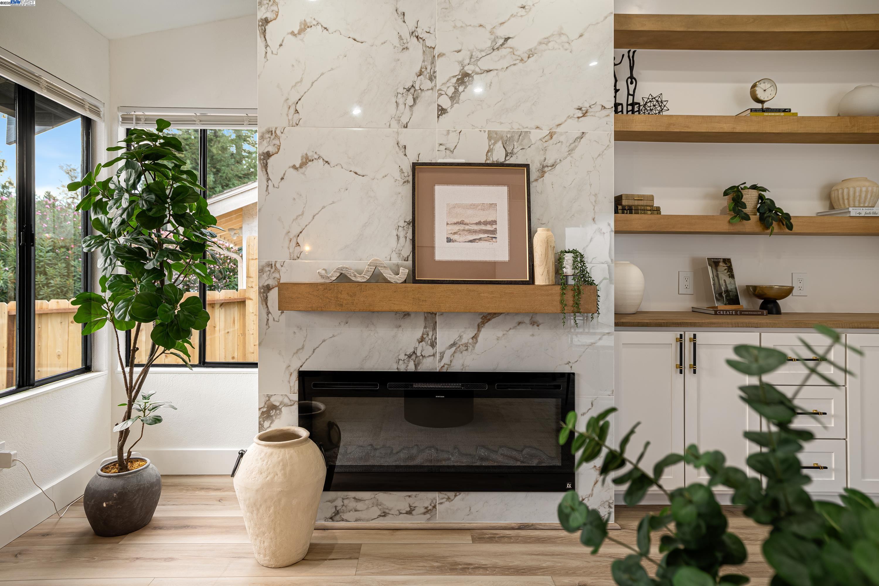 713 Sandy Brook Court Rodeo, CA 94572 - Photo 9 of 36 a living room with furniture and a potted plant