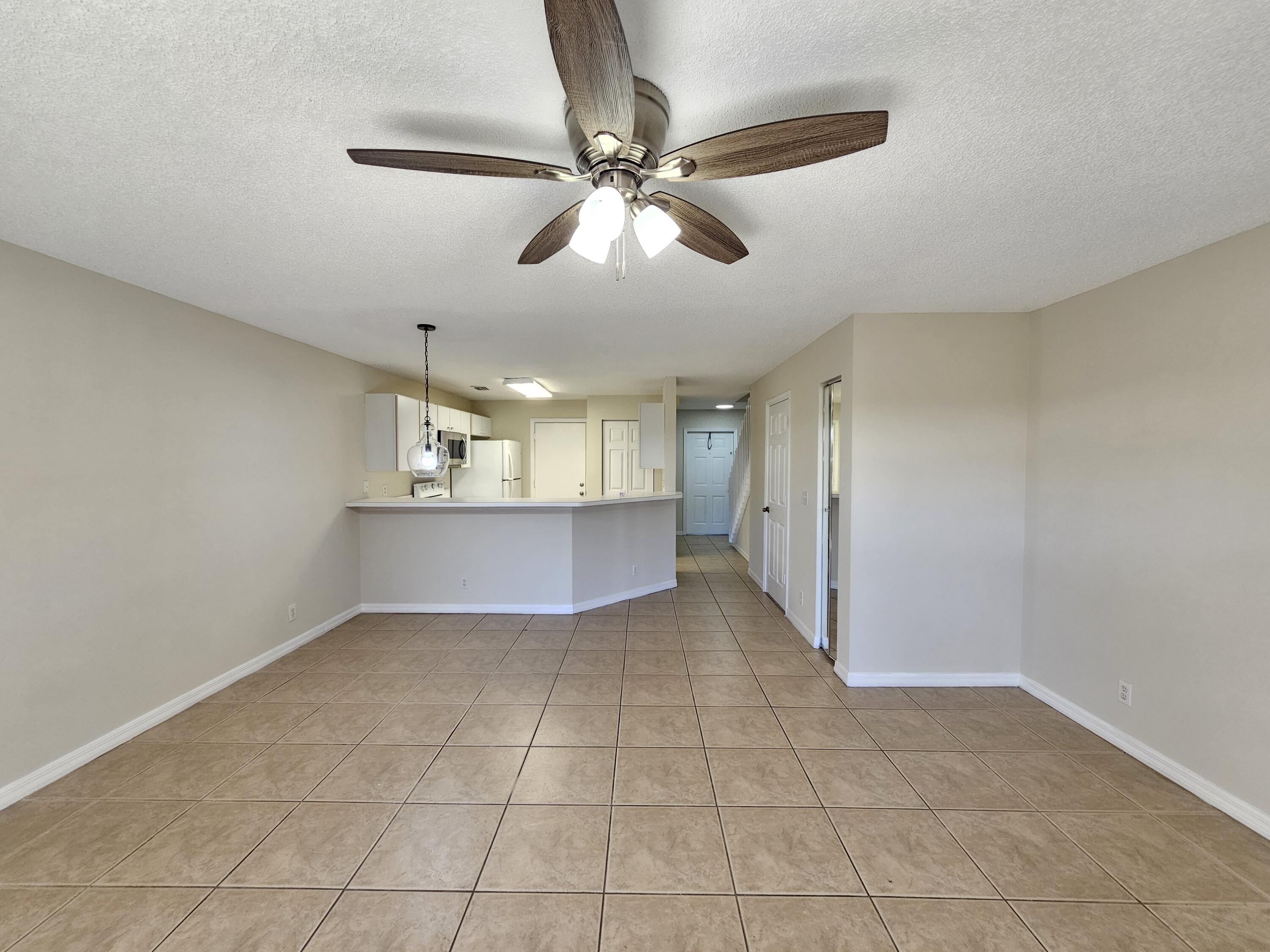 145 Fox Meadow Run Jupiter, FL 33458 - Photo 11 of 30 Living - Dining (2)