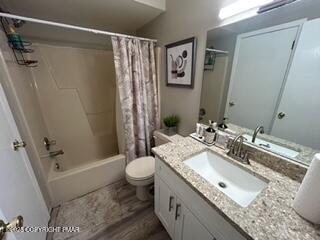 3328 Windermere Drive Bushkill, PA 18324 - Photo 20 of 33 a bathroom with a granite countertop sink toilet and shower