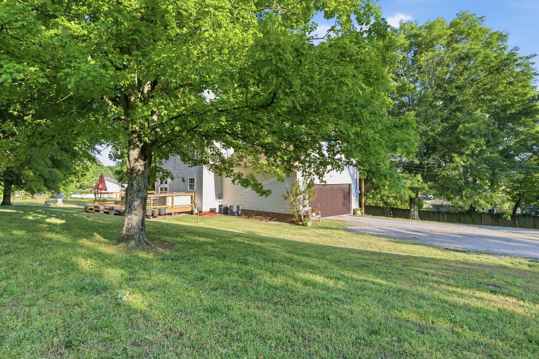 1038 South Cross Bridges Road Mount Pleasant, TN 38474 - Photo 25 of 39 a house with lots of trees