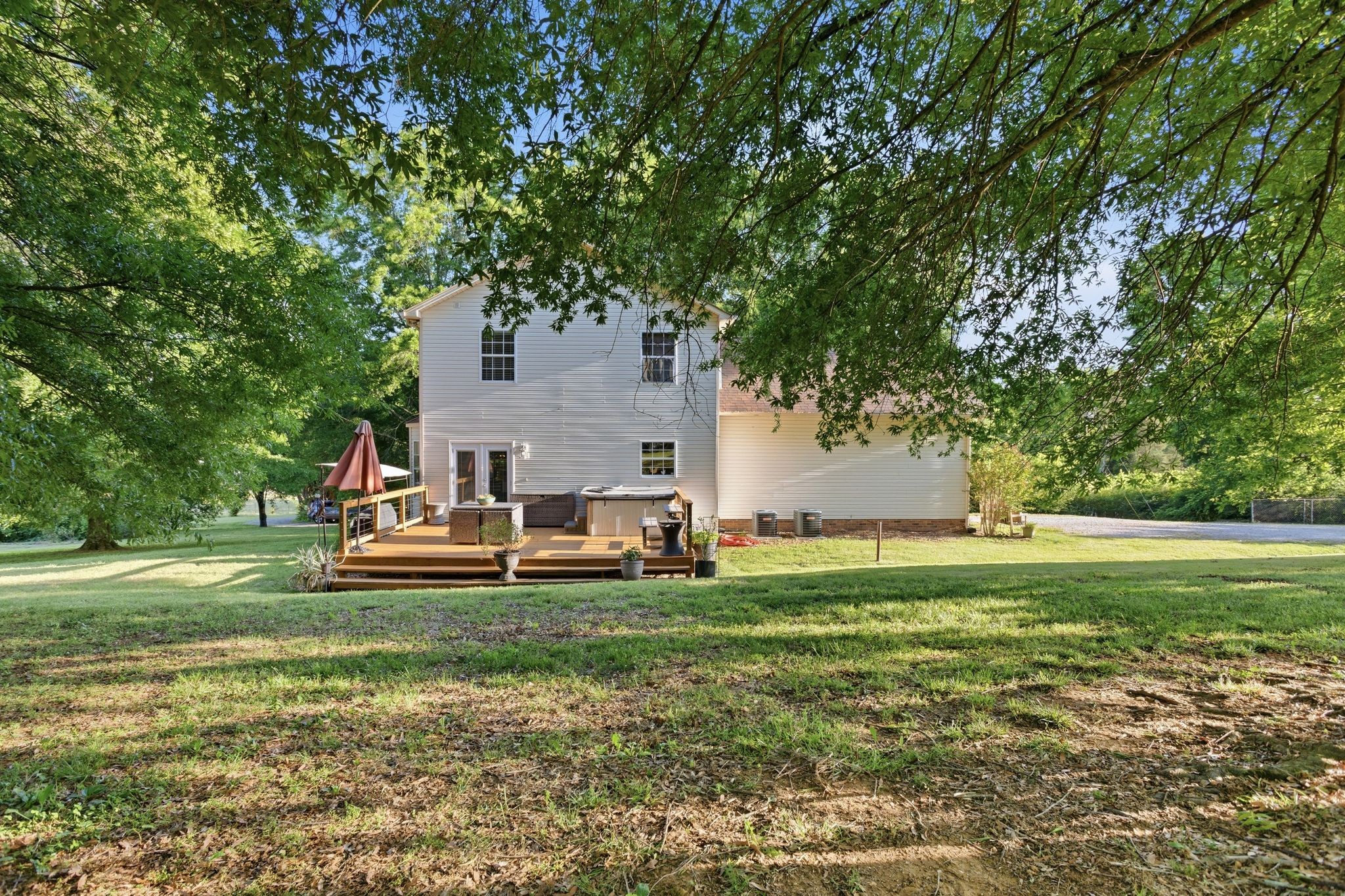1038 South Cross Bridges Road Mount Pleasant, TN 38474 - Photo 32 of 39 a view of a house with a yard and sitting area