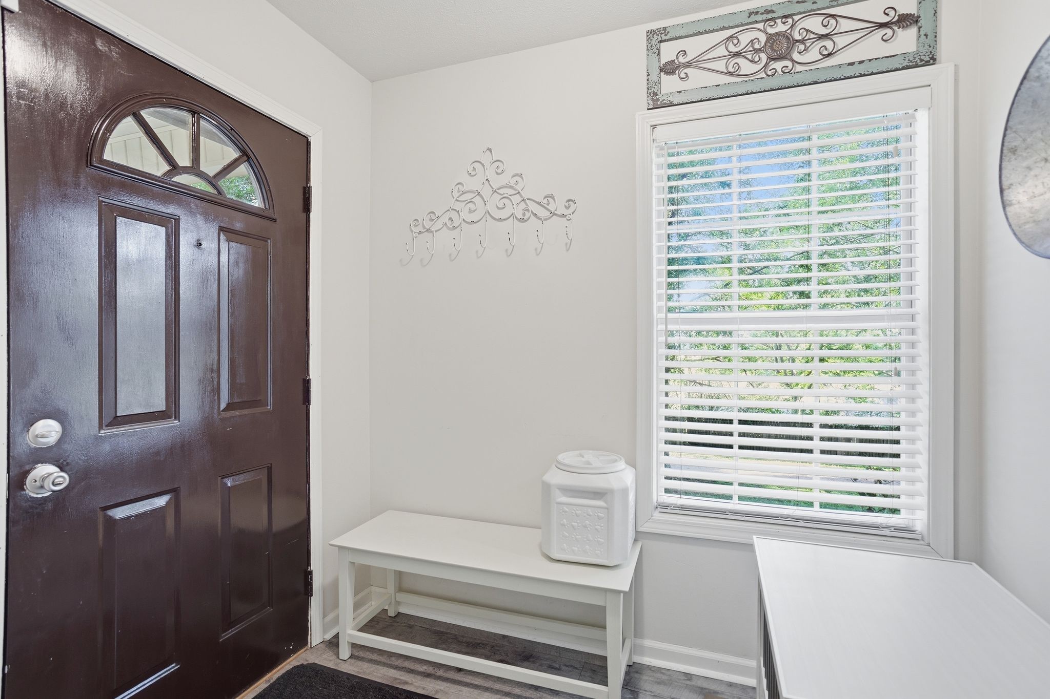 1038 South Cross Bridges Road Mount Pleasant, TN 38474 - Photo 5 of 39 a bathroom with a window a toilet and a shower