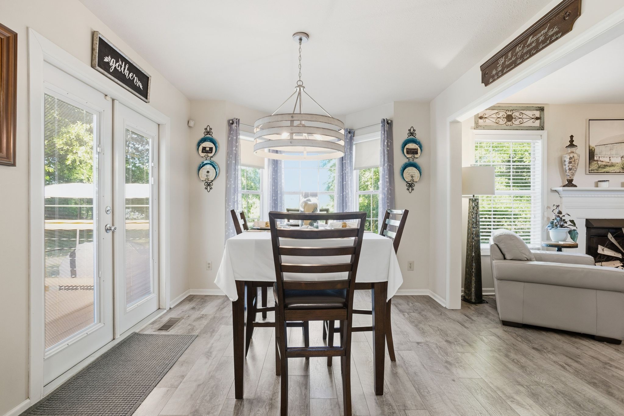 1038 South Cross Bridges Road Mount Pleasant, TN 38474 - Photo 10 of 39 a view of a dining room with furniture window and wooden floor