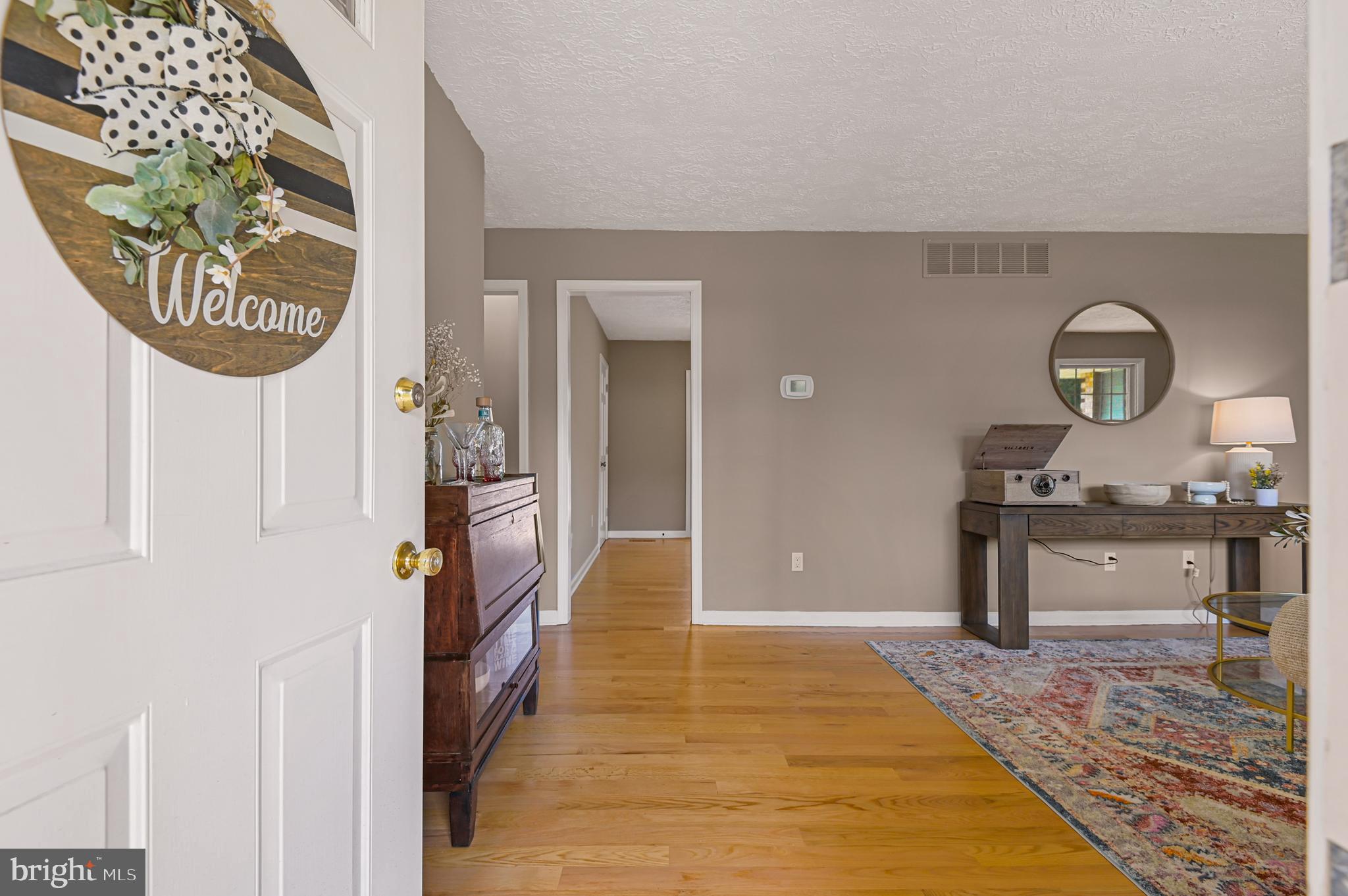 18111 Ridge Meadow Road Stewartstown, PA 17363 - Photo 4 of 38 Living Room with Access to Dining Room and Kitchen