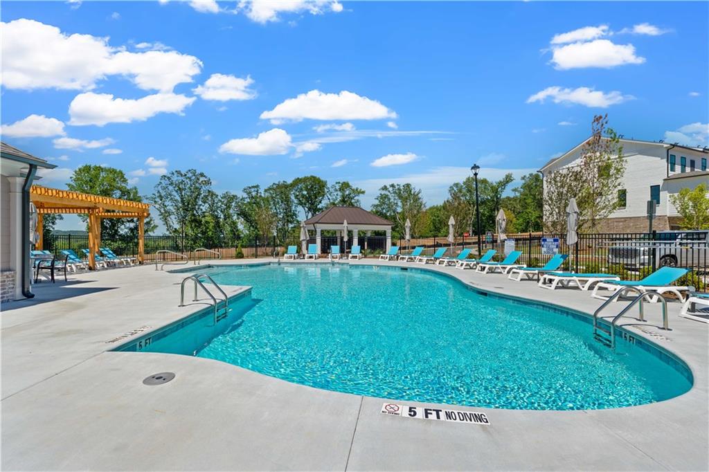 629 Silva Street, Unit 128 Cumming, GA 30040 - Photo 33 of 54 a view of swimming pool
